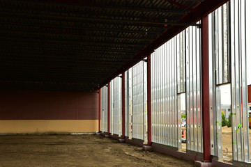 Interior of new steel frame commercial building under construction.