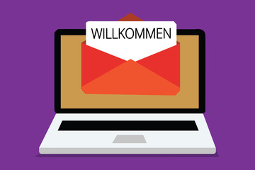 Handwriting text writing Willkommen. Concept meaning welcoming people event or your home something to that effect Computer receiving email important message envelope with paper virtual