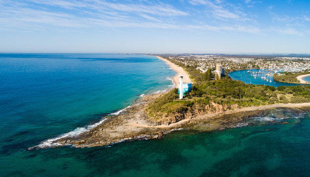 Beautiful aerial sunrise with beach, water, boats, shops and lovely holiday feel at Mooloolaba, Sunshine Coast, close to Brisbane in Queensland. Top view near Point Cartwright, river mouth and tourist