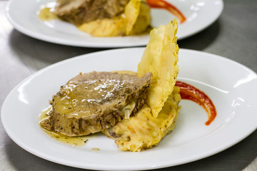 Beef and smashed potatoes