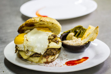 Homemade hamburguer with eggs