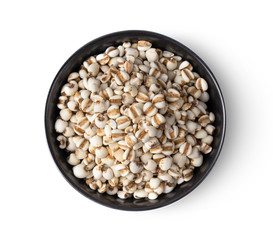  job's tears in black bowl isolated on white background. top view