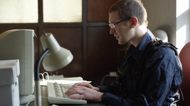 Police officer in precinct solving crimes