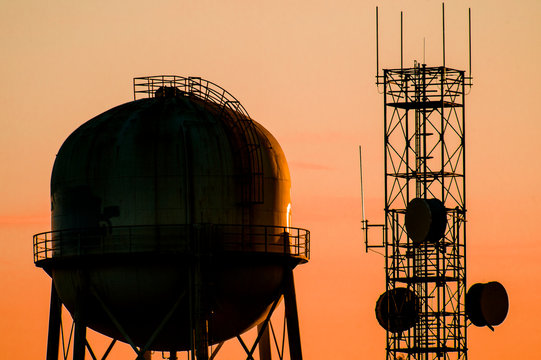 Water Storage Tank Next To Cell Phone Tower