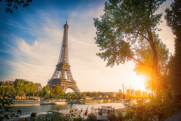 Sunset view of Eiffel tower and Seine river in Paris, France. Architecture and landmarks of Paris. Postcard of Paris