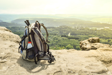 Hipster hiker tourist backpack on background nature in mountain, blurred panoramic landscape, traveler relax holiday concept, view planning wayroad in trip vacation, travel adventure.