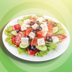 Greek salad with fresh vegetables on background