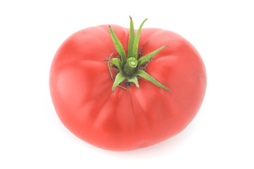 red tomato with green little leaves on isolated white background