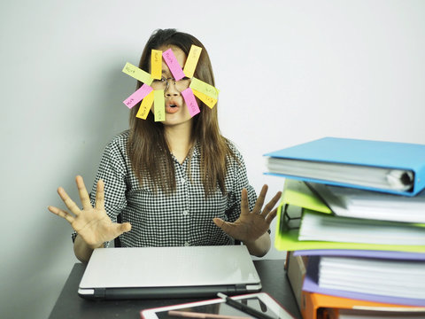 funny overworked businesses women working in office action reacts when the boss orders her too much