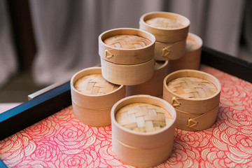 Mini Bamboo Dumpling Steamer on red tray