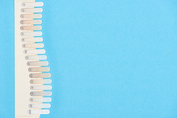 top view of teeth palette with different shades isolated on blue