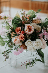 Modern Wedding Table Decor, Roses and peonies in vase at wedding reception, floral arrangement, trendy rustic garden flowers