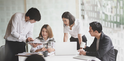 Motivated business team planing their marketing strategy
