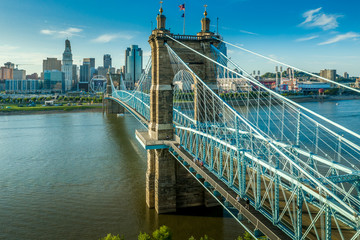 Panoramic view of Cincinnati downtown with the historic Roebling suspension bridge over the Ohio river