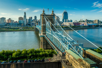 Panoramic view of Cincinnati downtown with the historic Roebling suspension bridge over the Ohio river