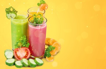 Healthy  vegetable juices on background