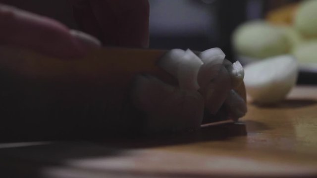 Women's hands wash, peel and cut vegetables into vegetable stew.