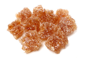 dark crystal sugar on white background