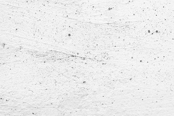 Texture of a concrete wall with cracks and scratches which can be used as a background