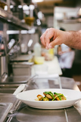 Preparing food in kitchen