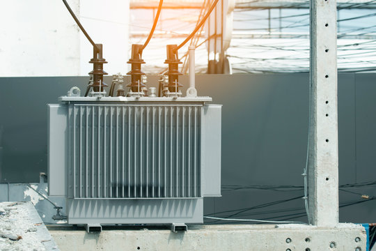 high-voltage power transformer on concrete pole