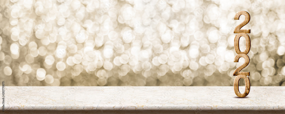 Aufkleber happy new year 2020 wood with sparkling star on marble table with gold bokeh background,holiday fest