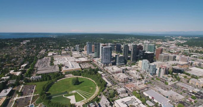 Downtown Bellevue, Washington USA - Park and Office Towers Overhead Wide Angle Aerial Shot of Cityscape on Sunny Day
