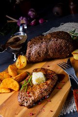 Butter Beef Steak with herbs and potato wedges