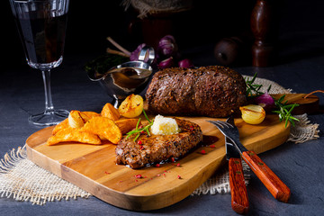 Butter Beef Steak with herbs and potato wedges