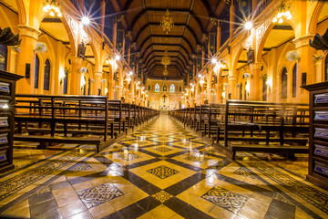 Obraz premium Cathedral of Immaculate Conception-Chanthaburi:June 23,2019,atmosphere in the church,which allows people to make a ceremony a Christian religious festival in Chanthanimit,waterfront community,Thailand