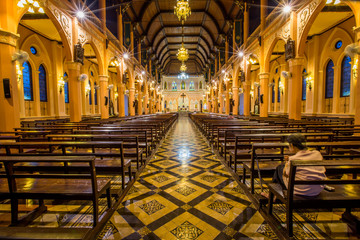 Obraz premium Cathedral of Immaculate Conception-Chanthaburi:June 23,2019,atmosphere in the church,which allows people to make a ceremony a Christian religious festival in Chanthanimit,waterfront community,Thailand