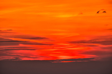 Fototapeta premium Stunning sunset in the mountains. Orange sky and mountains silhouettes. Carpathian Mountains. Bieszczady. Poland