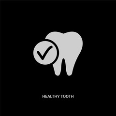 Obraz premium white healthy tooth vector icon on black background. modern flat healthy tooth from dentist concept vector sign symbol can be use for web, mobile and logo.