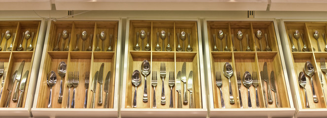 cutlery sets laid out in a box