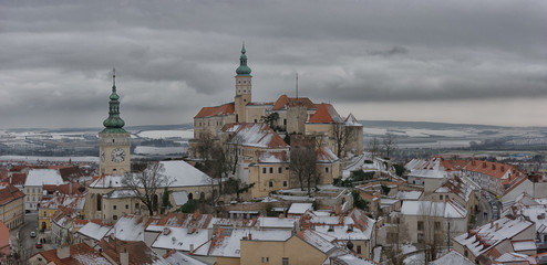Fototapeta na wymiar Winter landscape view on the snow cowere castle of Mikulov in Czech Republic