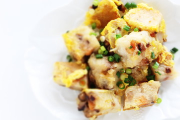 Chinese food, stir fried egg and turnip cake