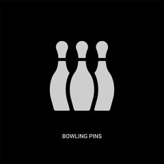 Fototapeta premium white bowling pins vector icon on black background. modern flat bowling pins from entertainment and arcade concept vector sign symbol can be use for web, mobile and logo.