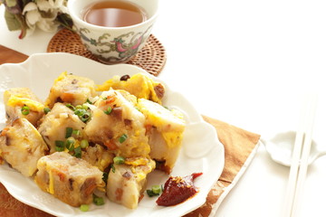 Chinese food, stir fried egg and turnip cake