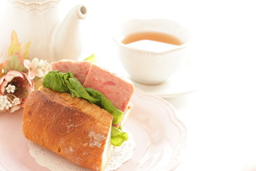 Homemade French bread and luncheon meat sandwich
