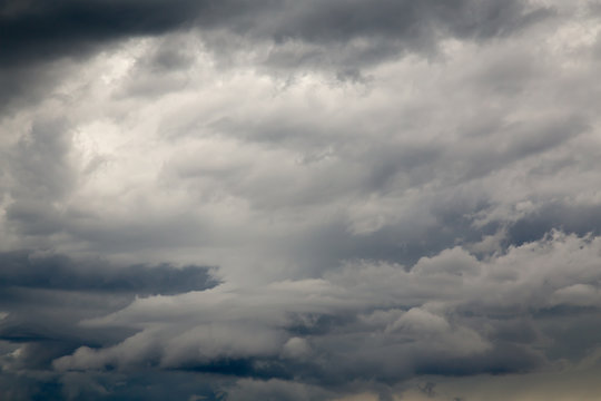 Dramatic Sky Background. Stormy Clouds in Dark Sky. Moody Cloudscape. Panoramic Image Can Be Used as Web Banner or Wide Site Header. Toned and Filtered Photo with Copy Space.