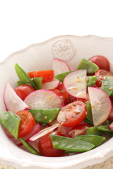 Radish and pea salad with sesame seed dressing