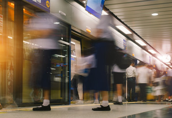 Motion Blurred image of passenger walk on the floor in rush hour at subway station Bangkok Thailand.