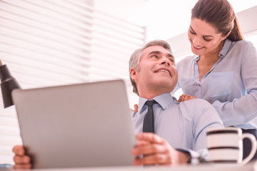 Man and woman have intimate relations on the workplace