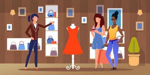 Diverse Female Friends Shopping at Clothing Store