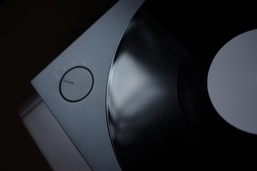 Clean new vinyl record disc spinning on turntable