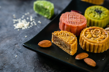 Mid Autumn Festival concept - yuebing monncakes on rustic background, copy space