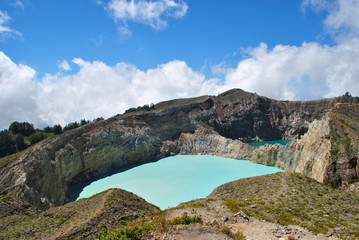 Kelimutu consists of 3 lakes that change color. Sometimes, are blue, green, and black, and some other times they turn to white, red, and blue.