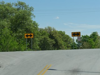Directional arrows in the road at an intersection