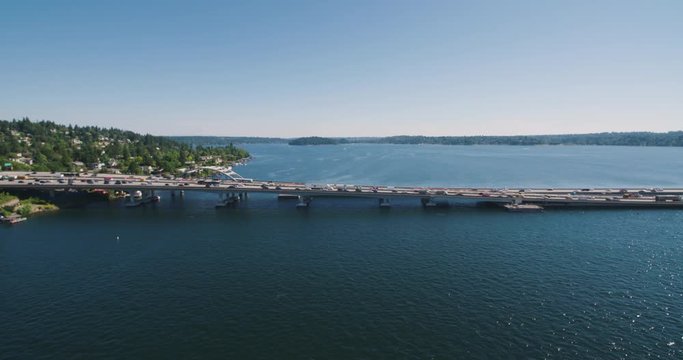 Traffic Crossing Floating Bridge Over Lake Washington From Bellevue to Seattle Aerial Shot