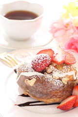 Fototapeta na wymiar Homemade strawberry and caramel donut